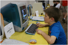 Boy playing on a computer
